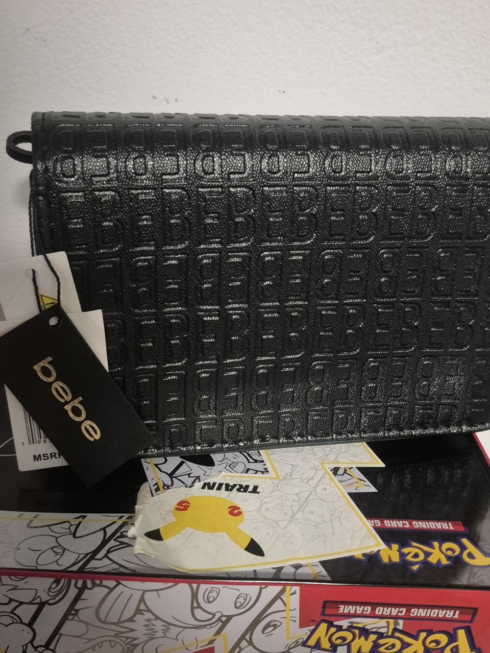 bebe Black Embossed Logo Men's Clutch